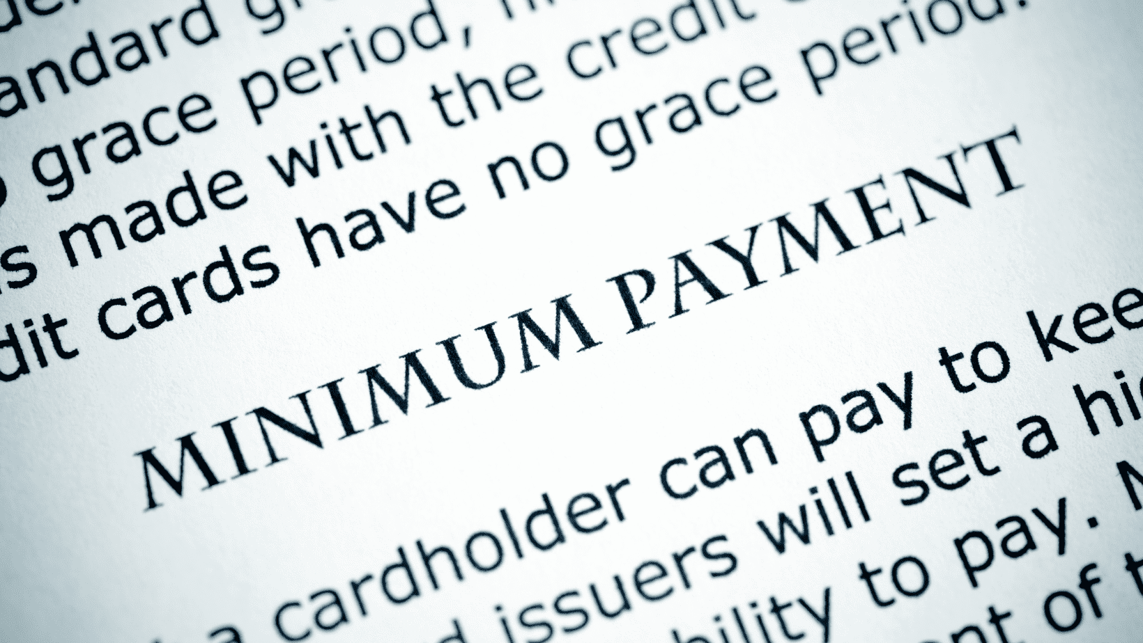 Close-up of a credit card statement showing the minimum payment section.