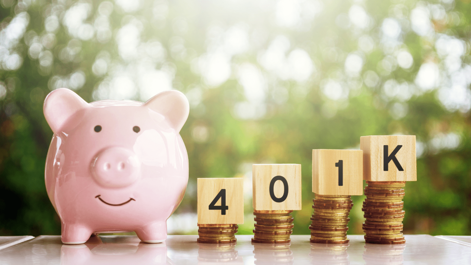 Piggy bank with coins stacked to form "2021" on a sunny outdoor background.