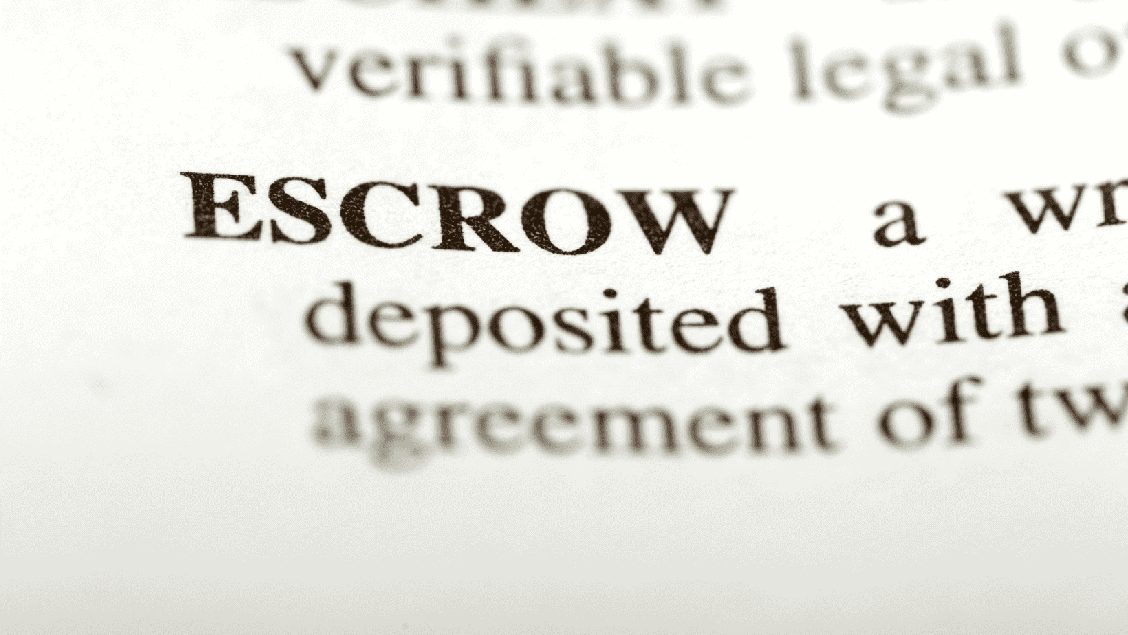 Close-up of the word "ESCROW" in a legal document.